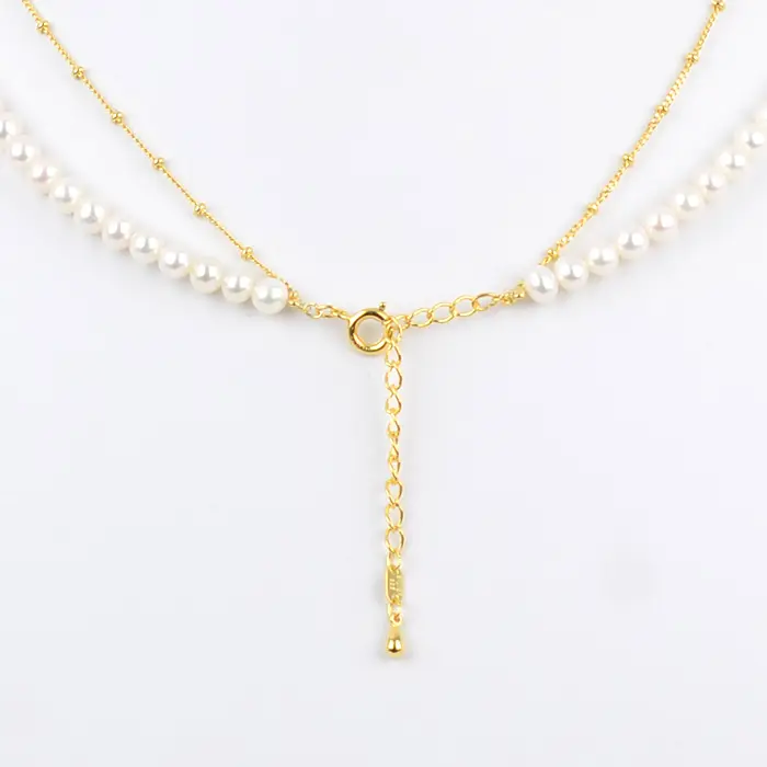 淡水真珠(5.5-6mm) ｺﾞｰﾙﾄﾞﾃﾞｻﾞｲﾝNE 029