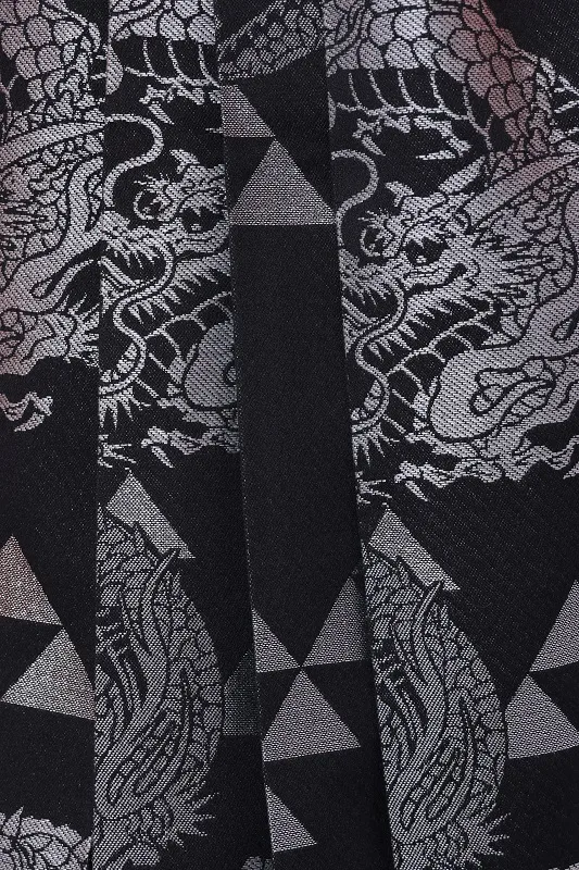 紋付袴226/幸彩オレンジ/黒地龍ウロコ柄